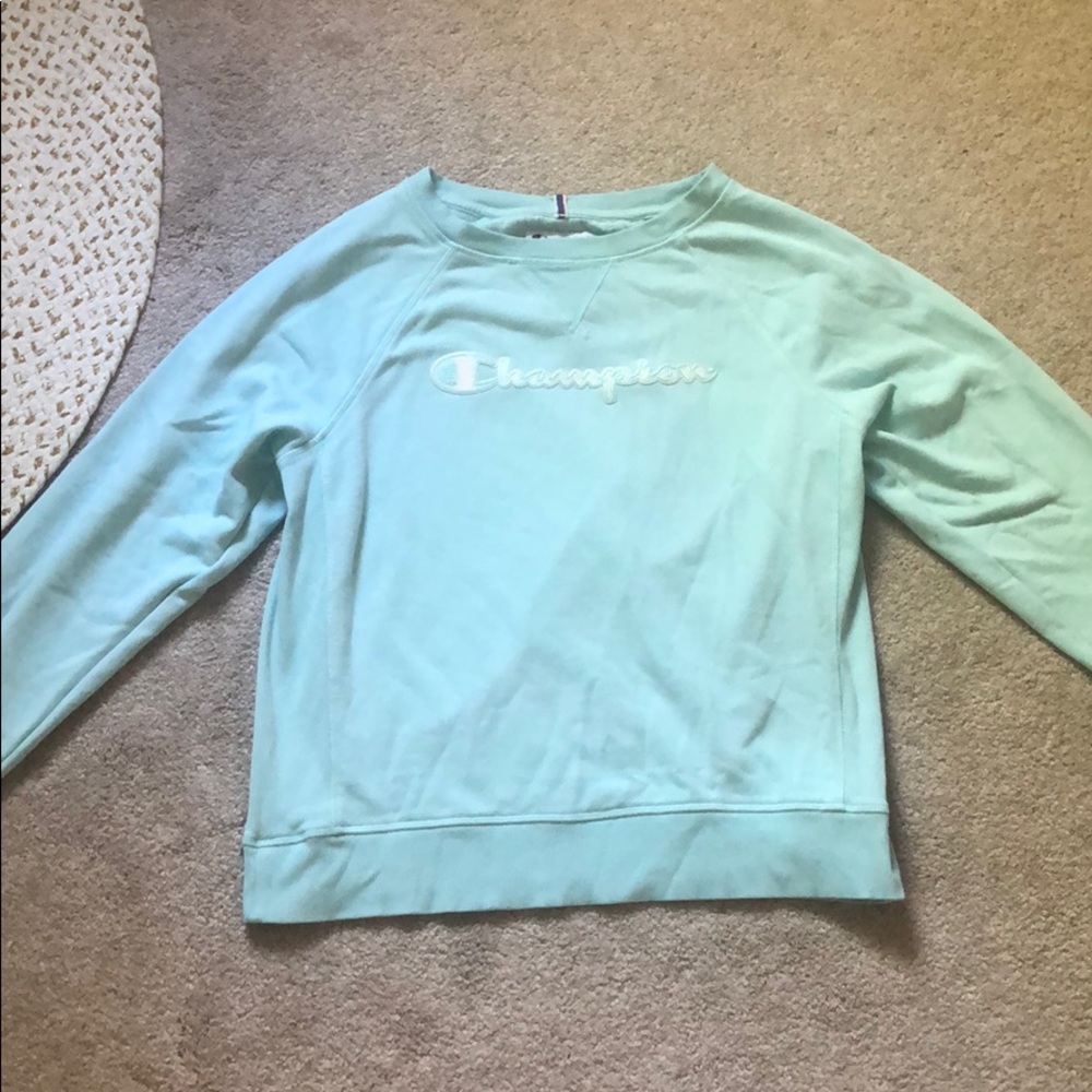 A champion  baby blue crewneck